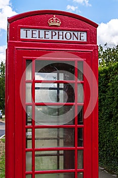 Red Telephone Box with Blue Sky