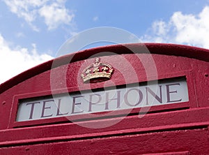 Red Telephone Box with Blue Sky