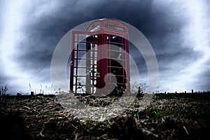 A red telephone box in the middle of nowhere