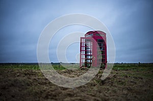 A red telephone box in the middle of nowhere