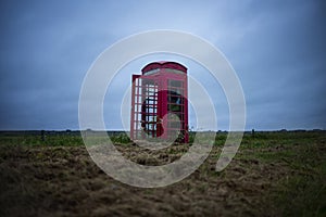 A red telephone box in the middle of nowhere