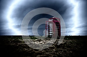 A red telephone box in the middle of nowhere