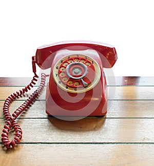 Red telephone vintage old style on table