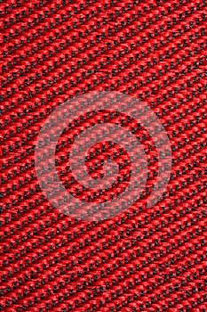 Red textural fabric, pattern on diagonal photo