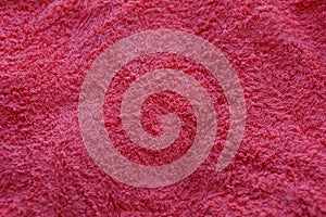 Red texture of woolen fabric from a piece of clothing