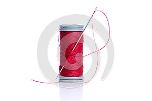 Red thread bobbin and needle