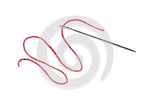 Red thread and needle isolated on white photo