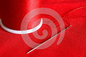 Red Thread and Sewing Needle