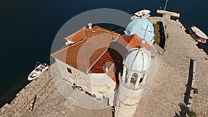 Red tiled roof of the Church of Our Lady of the Rocks. Montenegro