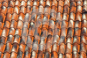 Red tiles roof texture architecture background, detail of house Close up