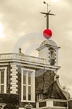 Red time ball on top the octagon room of the Royal Observatory in Greenwich photo