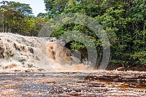 Waterfall cascading into the Amazon River at Presidente Figueiredo in Brazil, South America photo