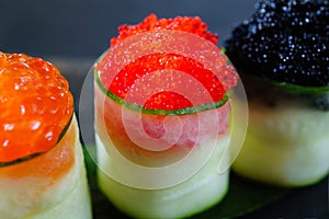 Red and tobiko caviar topped sushi rolls set