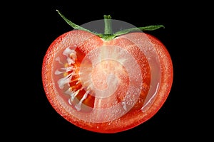 The red tomato cut half-and-half