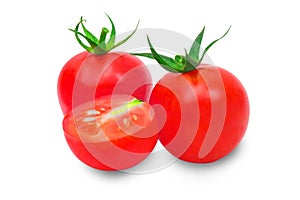 Red Tomato with cut in half isolated on white