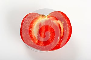 Red Tomato slice isolated on white background, top view