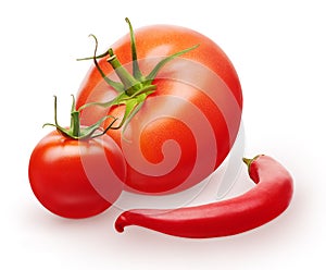 Red tomato, small cherry with green leaves and chili pepper