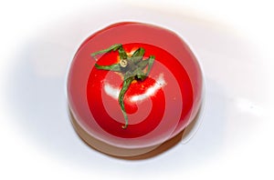 Red tomato on a white background