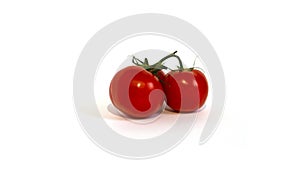 Red tomatoe isolate. Tomatoes on branch, side view. Element of healthy food. Isolate on white