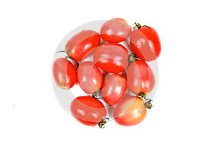 Red tomatoes isolated on a white background.