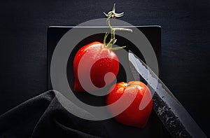 Red Tomatoes and Japanese Knive photo