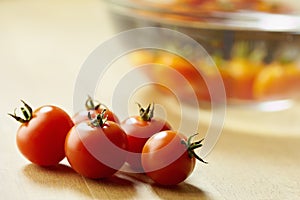 Red tomatoes on kitchen table