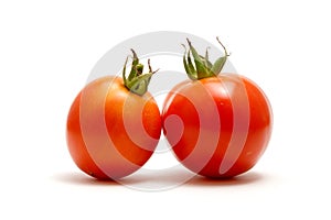 Red tomatoes on white backgrou