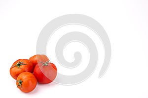 Red tomatoes on a white background