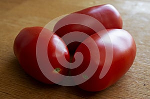 Red Tomatoes On Wood Table