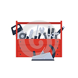 Red toolbox with instruments and hand tools inside
