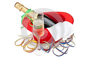 Red top hat with champagne and glass