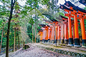 Red Tori Gate at Fushimi Inari Shrine Temple in Kyoto, Japan .