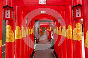 Red Tori gate at Sairaiin in Naha, Okinawa, Japan