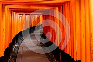 Red Tori Gates of Fushimi Inari Shrine in Kyoto, Japan.