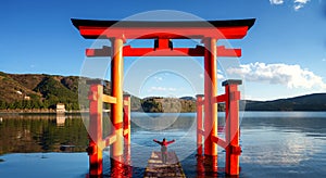 Red torii on the Hakone lake, Japan