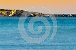 Red Torii on Outcrop of Shoreline