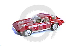Red toy car isolated on white background