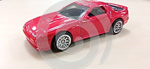 red toy car miniature for automotive hobbyists