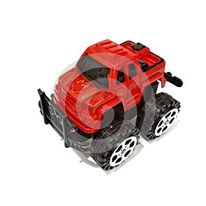 red toy car offroad isolated on white