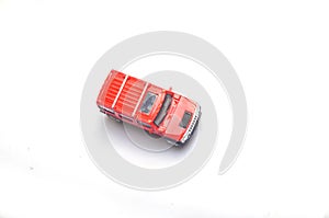 RED toy mini car on white background