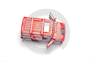 RED toy mini car on white background