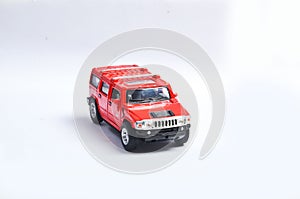 RED car white background indoor