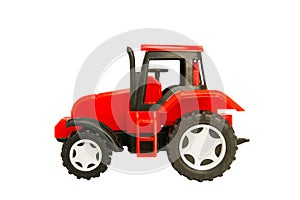 Red toy tractor isolated on white background