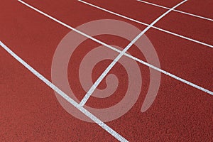 Red track and field lanes. Running lanes at a track and field athletic center. Horizontal sport theme poster, greeting cards, head