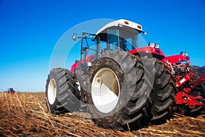 Red tractor in the field