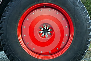 Red wheel tire tractor large metal rim