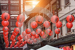 Red traditional paper lanterns with Chinese zodiac pattern