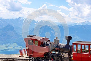 Red Traditional train on the top of European mountain