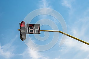 Red Traffic light on blue sky