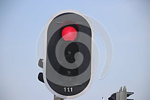 Red traffic light on a crossing in the netherlands